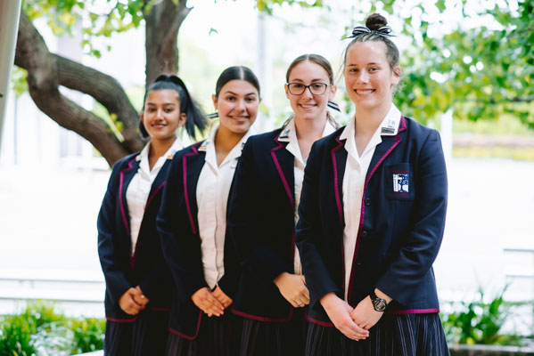 Bethany College Hurstvillestudents standing in front of school